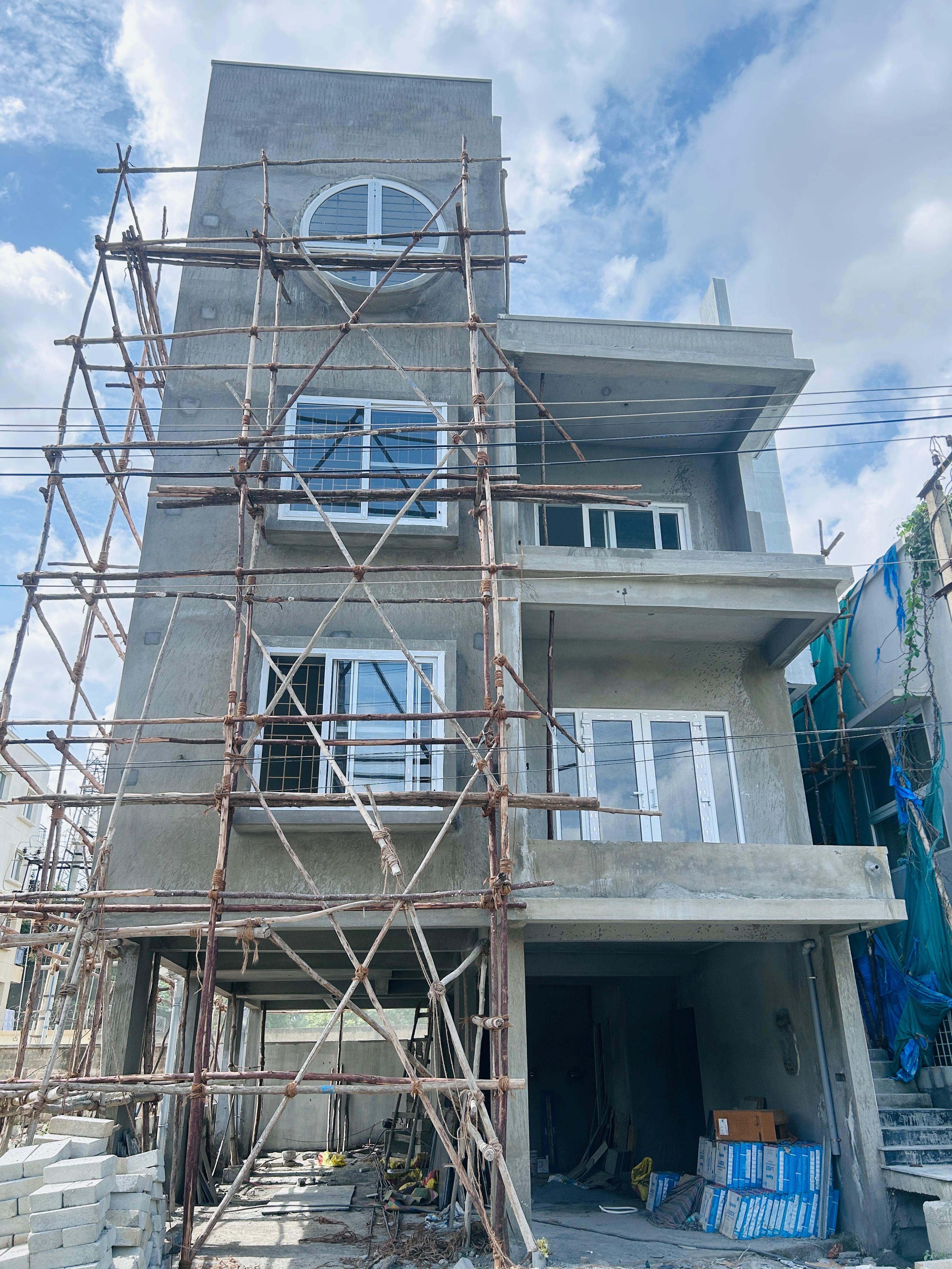 uPVC bay window installed in a luxury villa in Coimbatore by MG Windows and Doors